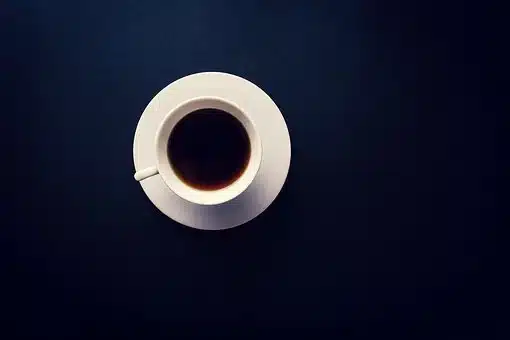 A cup of Americano on a blue background